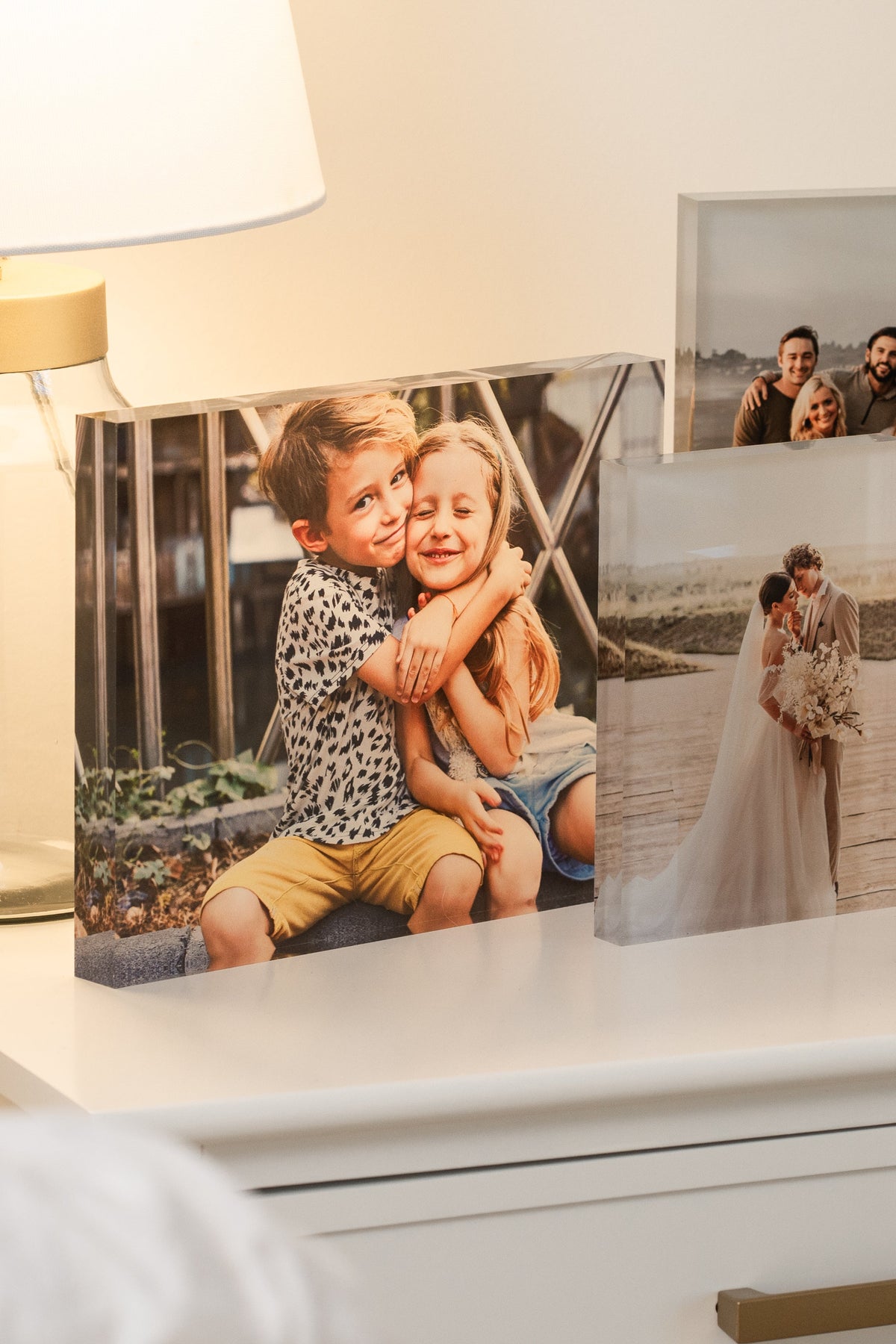 Clear 3/4 in acrylic photo display block with mounted picture panel.