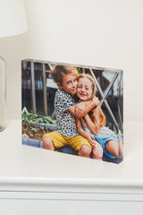 Clear 3/4 in acrylic photo display block with a family portrait print.