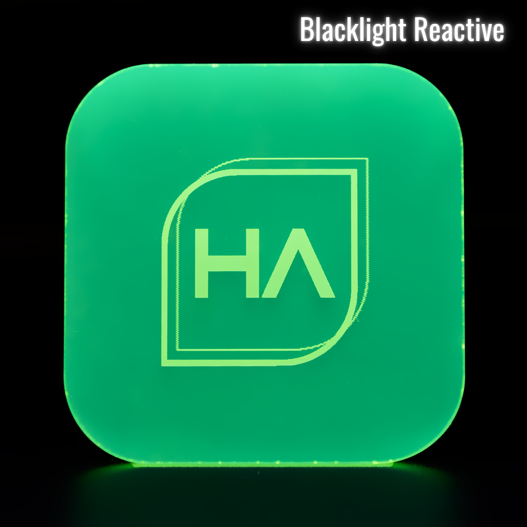 Blacklight-reactive frosted neon green cast acrylic sheet, 1/8 in, glowing front