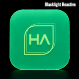Blacklight-reactive frosted neon green cast acrylic sheet, 1/8 in, glowing front