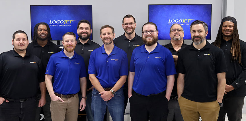 Technical support team in branded polo shirts, onsite service group photo