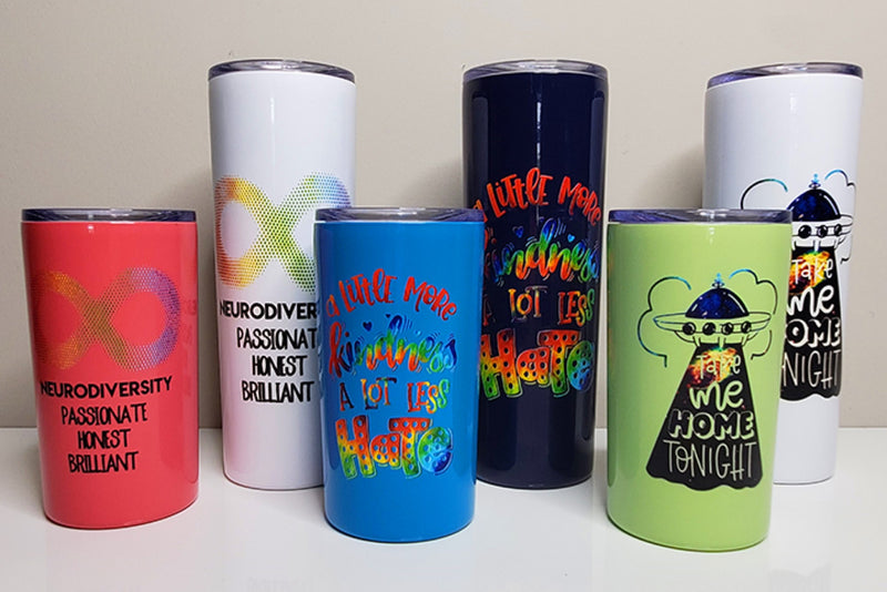 Various travel mugs with images printed with a UV printer
