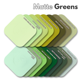 Assorted matte green cast acrylic sample squares in varying pastel to deep hues