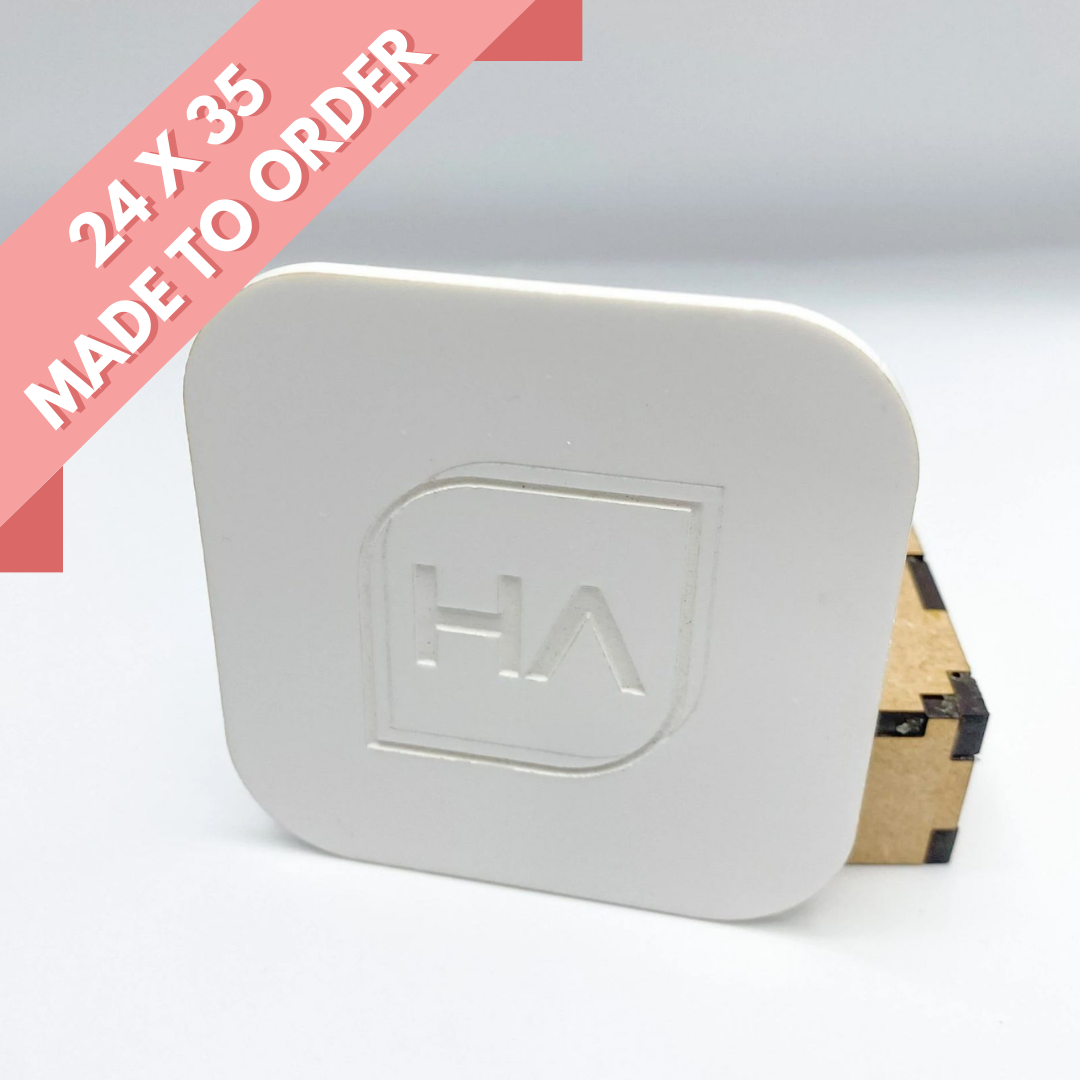 Opaque gloss white acrylic sheet with rounded corners, close view of smooth face and side edge