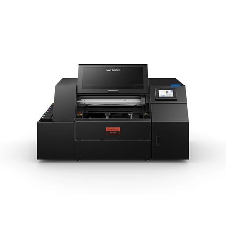 A Roland brand industrial laser cutter or engraver machine in matte black, shown from a front-three-quarter angle on a clean white background.