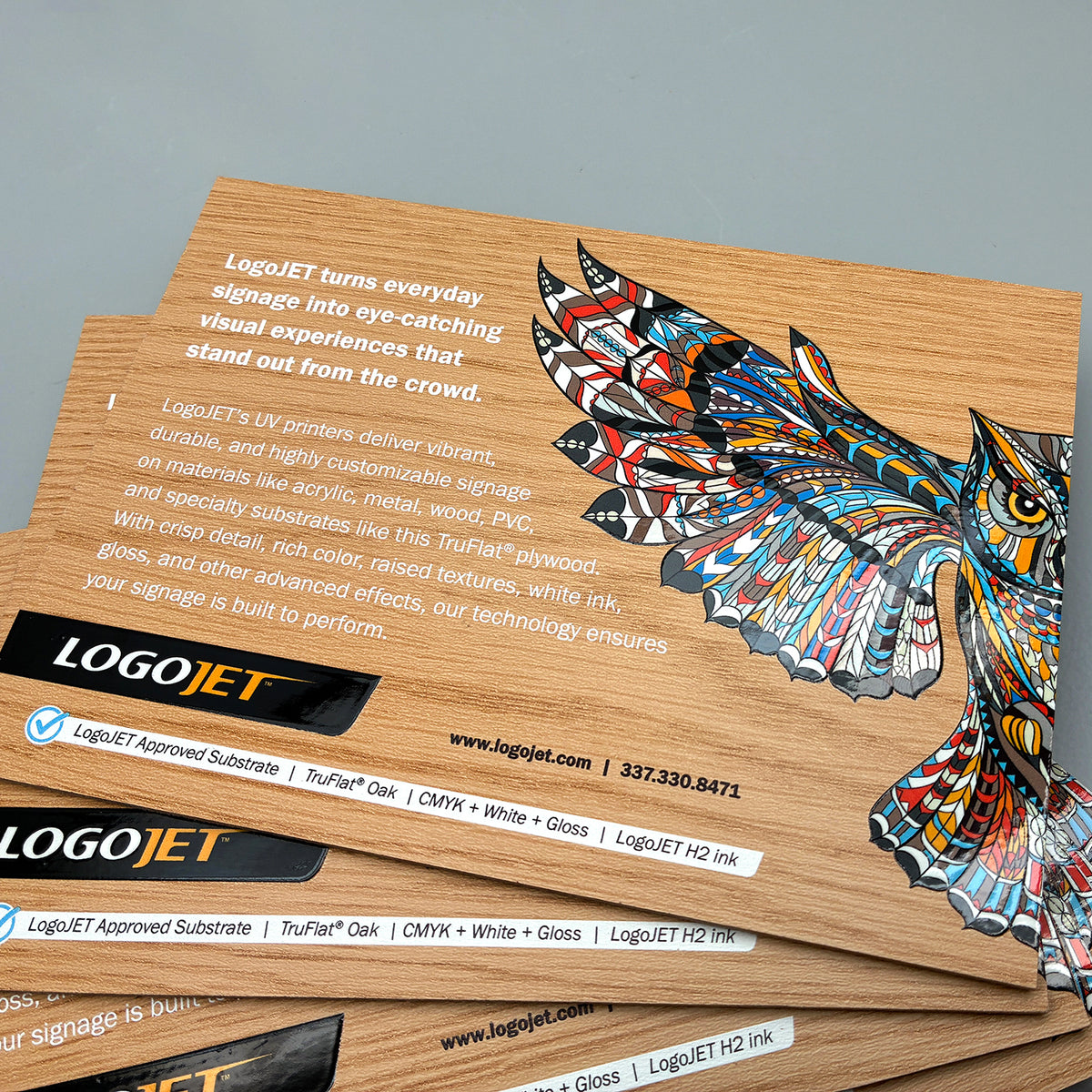 Printed TruFlat Oak wood sign boards with colorful bird graphic and text