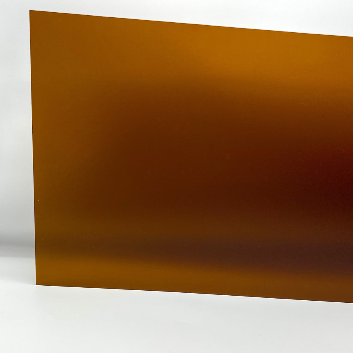 Amber frosted acrylic sheet with matte finish, straight edge view