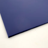 Navy blue matte acrylic sheet corner close-up with smooth edge