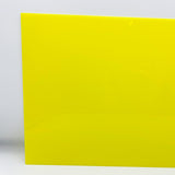 Fluorescent neon yellow cast acrylic sheet corner view, smooth glossy surface