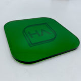 Translucent green glossy acrylic sheet with rounded corners and beveled dark edge