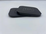 Stacked glossy black cast acrylic pieces with HA logo on top, rounded corners