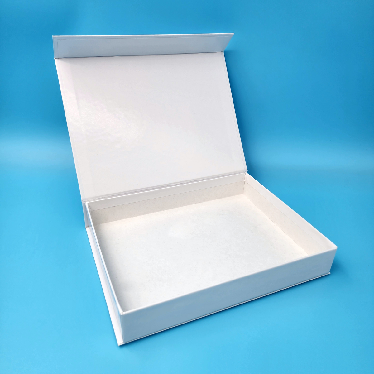 Large rigid magnetic closure box with hinged lid open, empty base tray visible