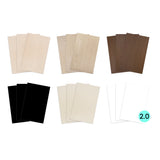 Assorted prefinished laser wood sheets in light, tan, dark, and black